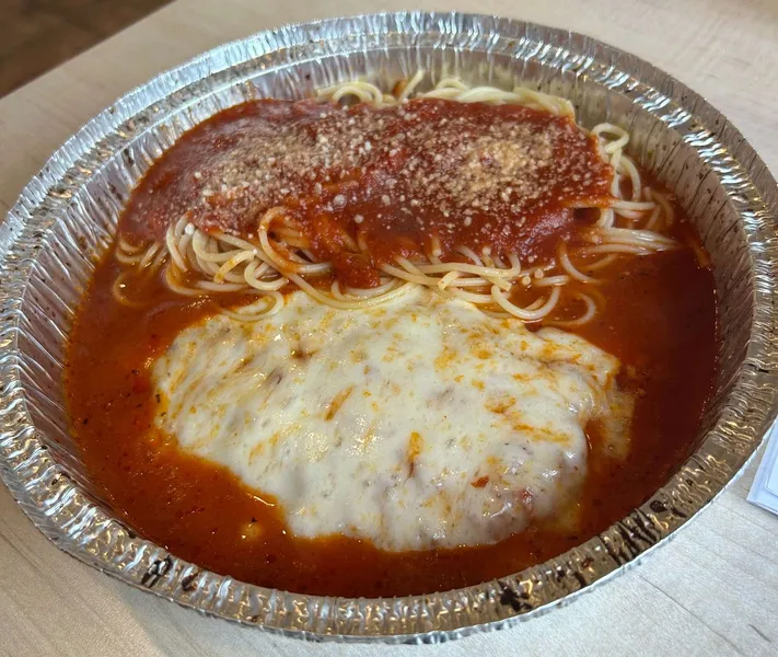 Chicken Parmigiana with pasta at Aldo's Pizza